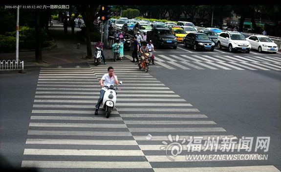 150辆车闯红灯被曝光 抓拍行人和骑车人系统再增一处