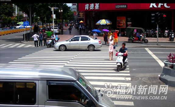 150辆车闯红灯被曝光 抓拍行人和骑车人系统再增一处